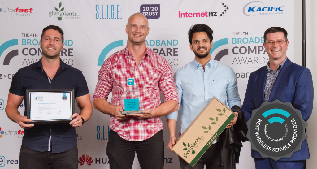 Wireless Nation team members on stage accepting the award